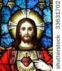 stock-photo-jesus-in-stained-glass-33631702.jpg