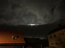 hiding moon light dark.webp