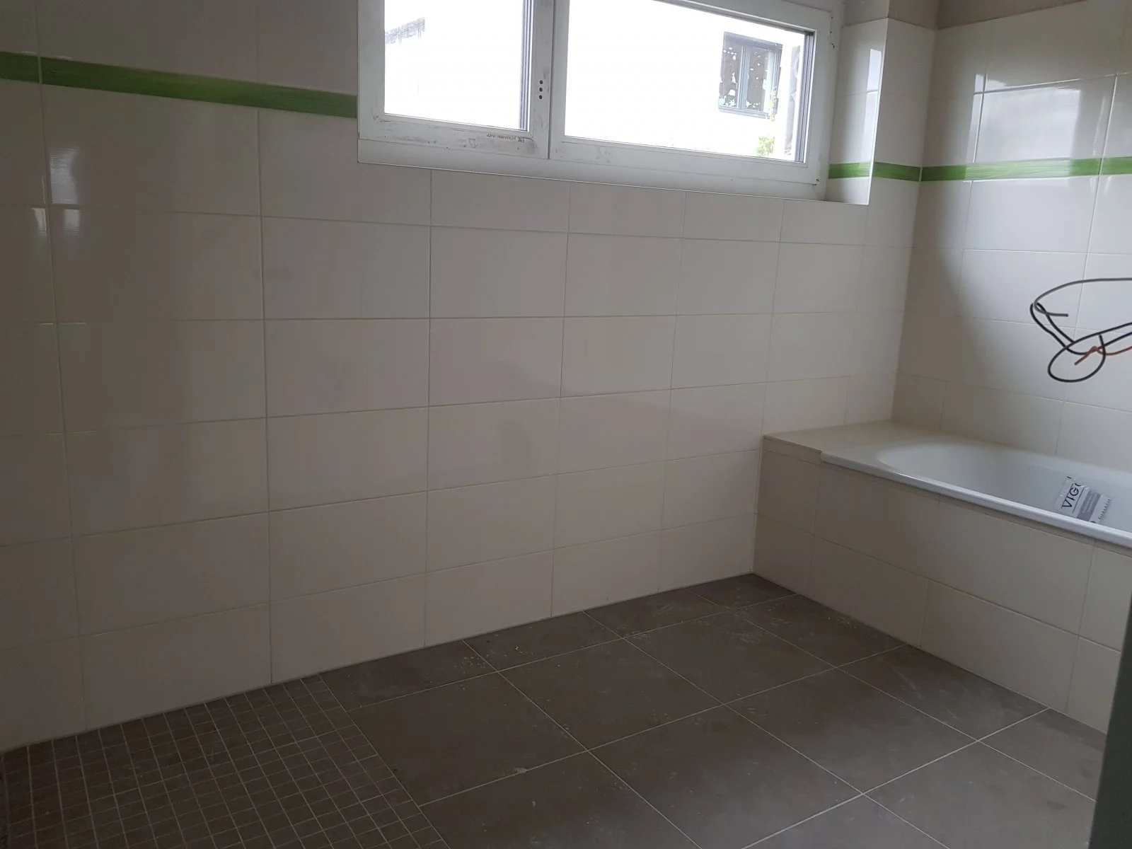 Bad mit Duschbereich